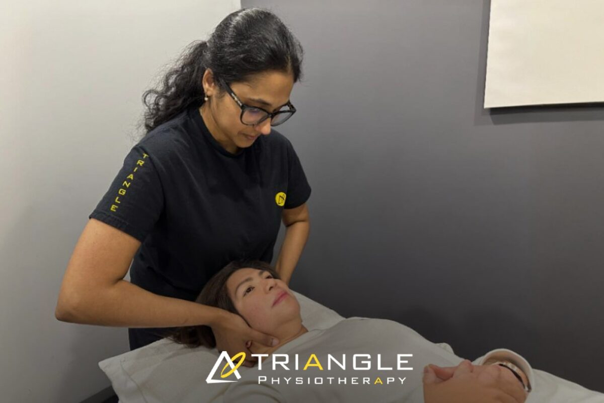 Close-up of hands-on manual therapy at a Toronto physiotherapy clinic